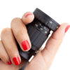 Hand holding collapsed Pocket Mini Director's Viewfinder